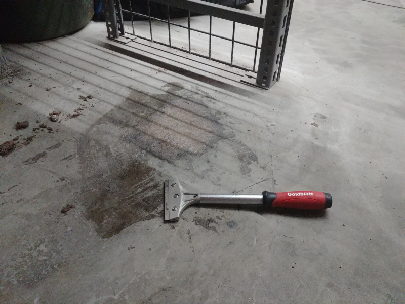 A scraper may be used before material fully hardens